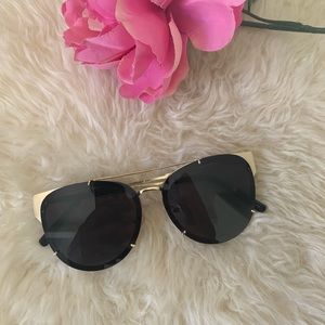 Gold frame sunglasses